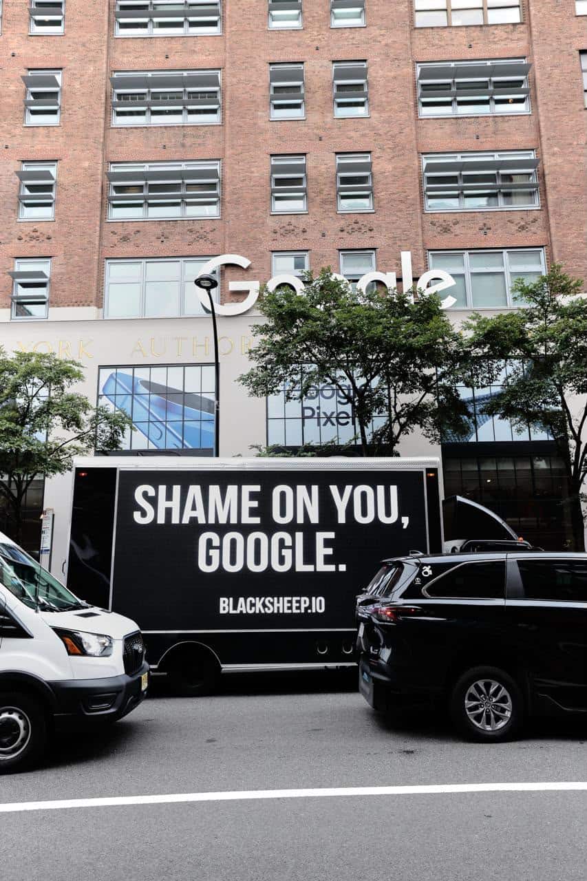 Pedestrians observing Blacksheep guerrilla campaign trucks outside Google NYC