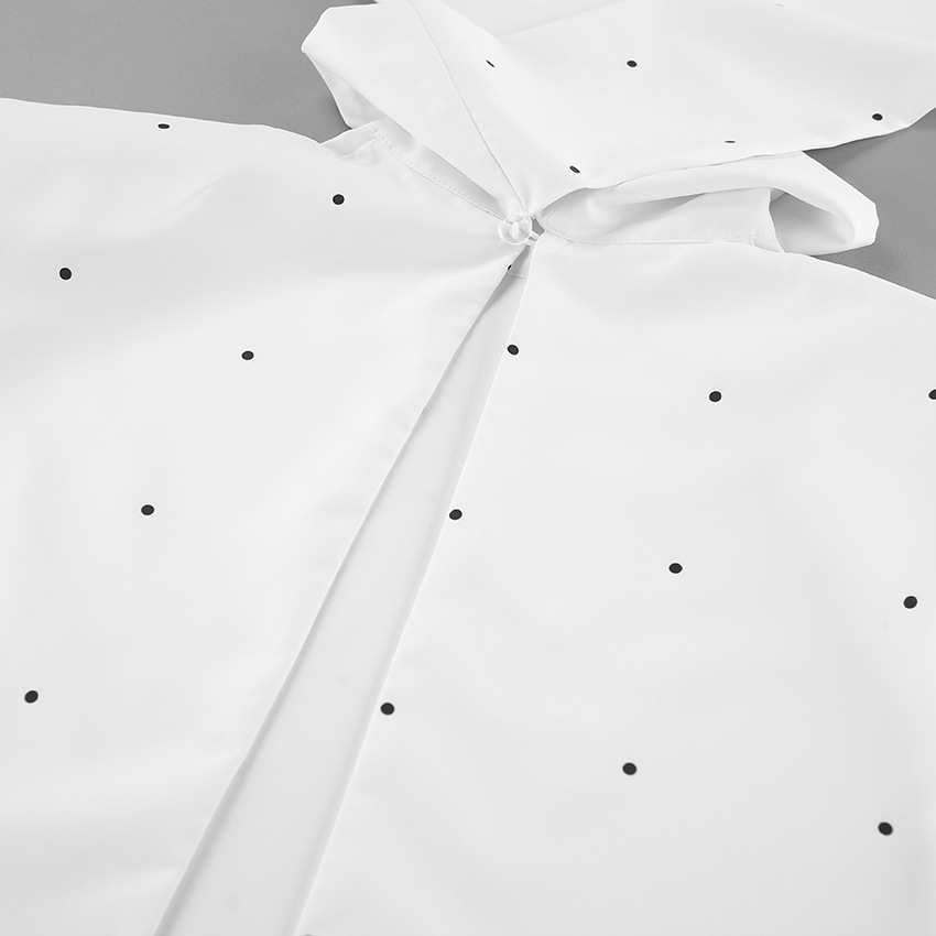 Chemisier sans manches à pois et col montant avec lien dans le dos