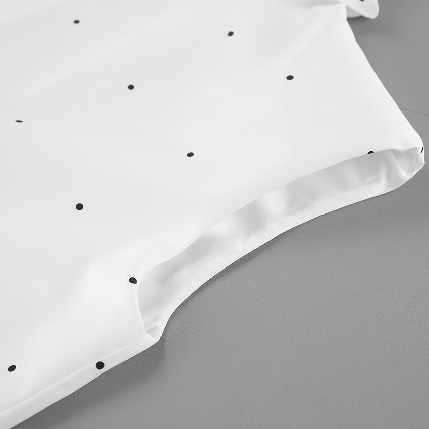 Chemisier sans manches à pois et col montant avec lien dans le dos