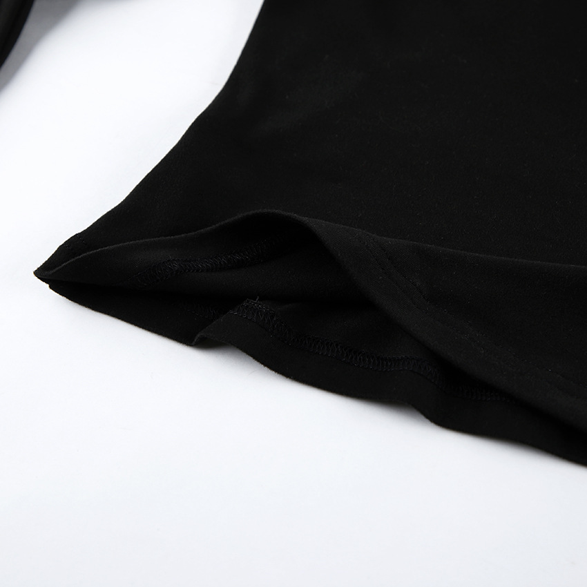 Haut chic noir à épaules dénudées et manches longues à nouer