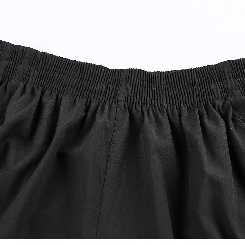 Pantaloncini da allenamento da uomo, vestibilità ampia e ad asciugatura rapida: abbigliamento sportivo estivo traspirante per attività all'aperto.