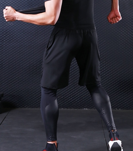 Pantaloncini da allenamento da uomo, vestibilità ampia e ad asciugatura rapida: abbigliamento sportivo estivo traspirante per attività all'aperto.