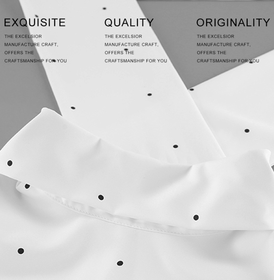 Chemisier sans manches à pois et col montant avec lien dans le dos