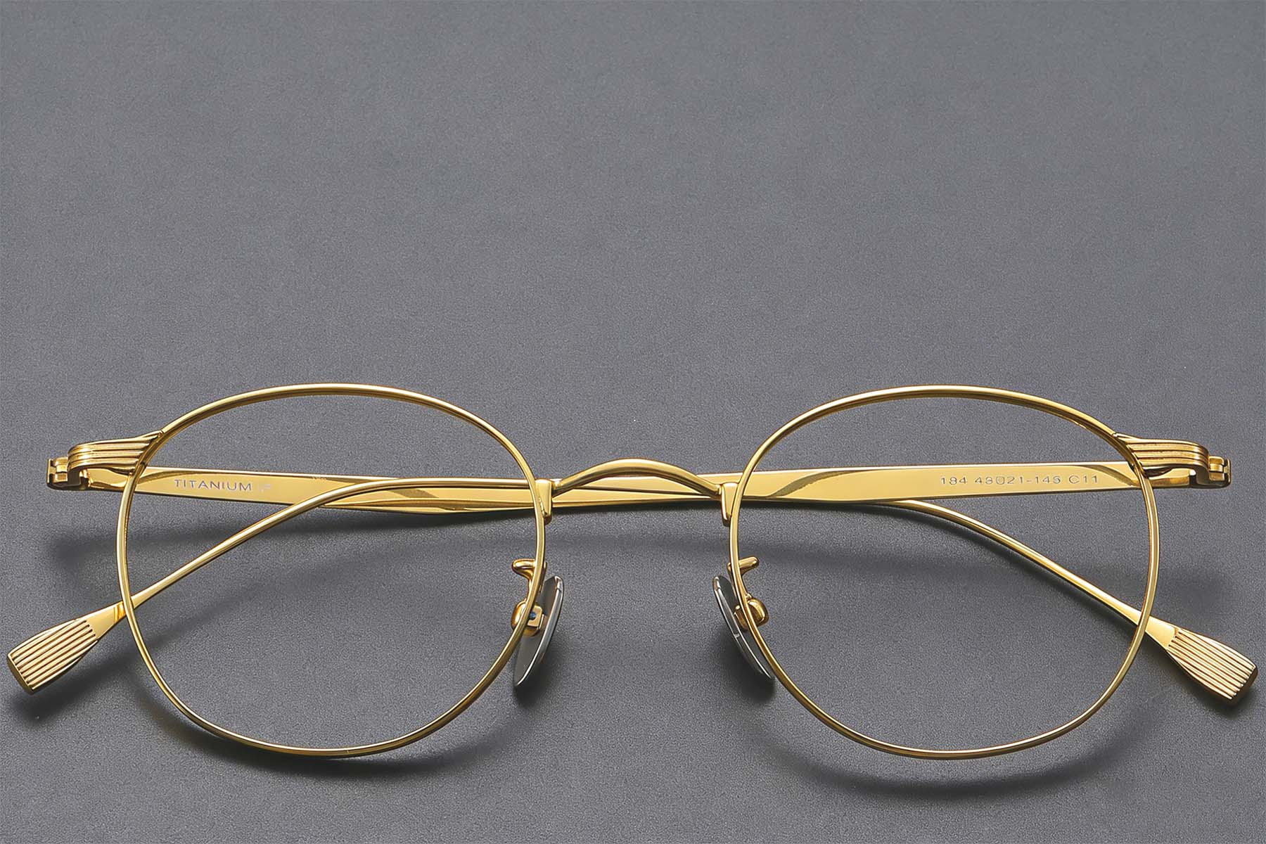 BS1913-0351_Golden_Oval_Titanium_Glasses_front