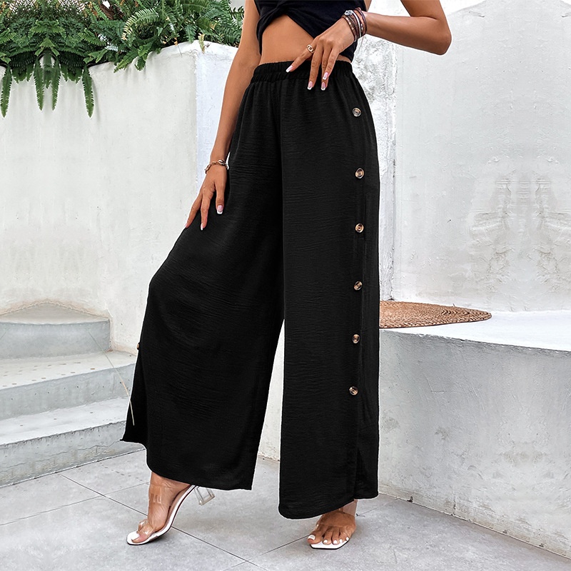 Pantalon palazzo noir à jambes larges et boutons latéraux