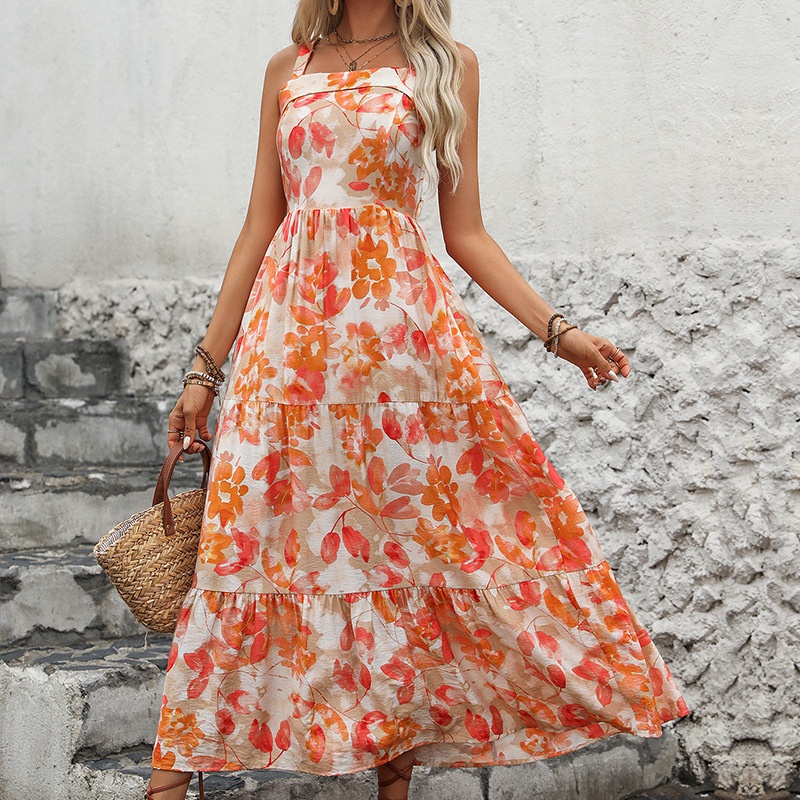 Abito lungo boho a balze con stampa floreale e schiena incrociata