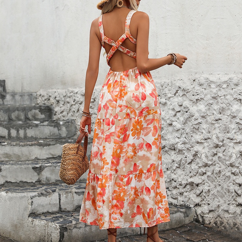 Abito lungo boho a balze con stampa floreale e schiena incrociata