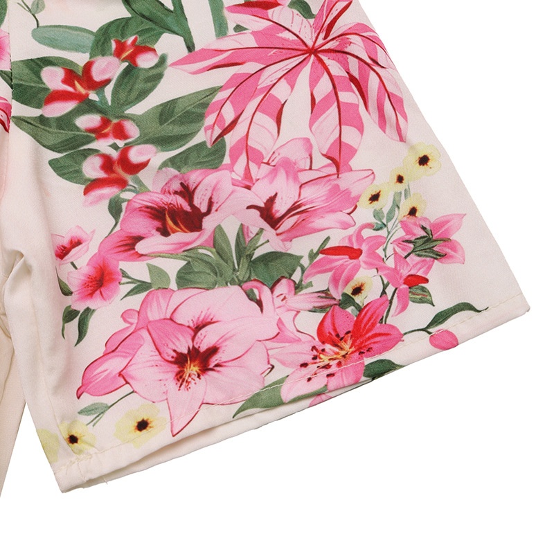 Robe midi élégante à col en V et manches bouffantes, ornée d'un imprimé floral