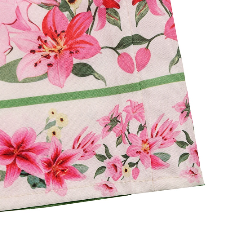 Robe midi élégante à col en V et manches bouffantes, ornée d'un imprimé floral