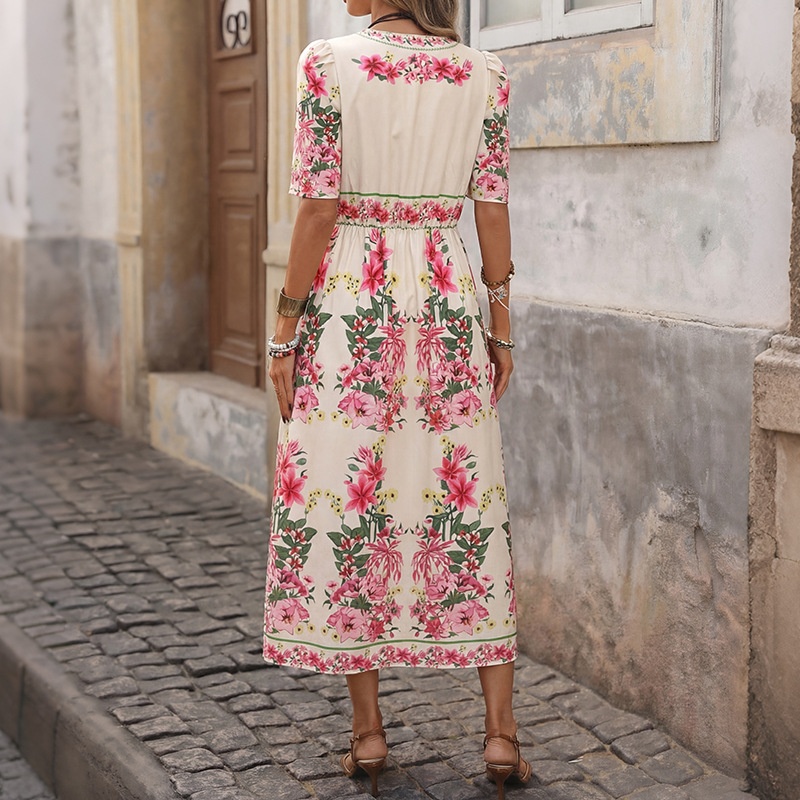 Robe midi élégante à col en V et manches bouffantes, ornée d'un imprimé floral