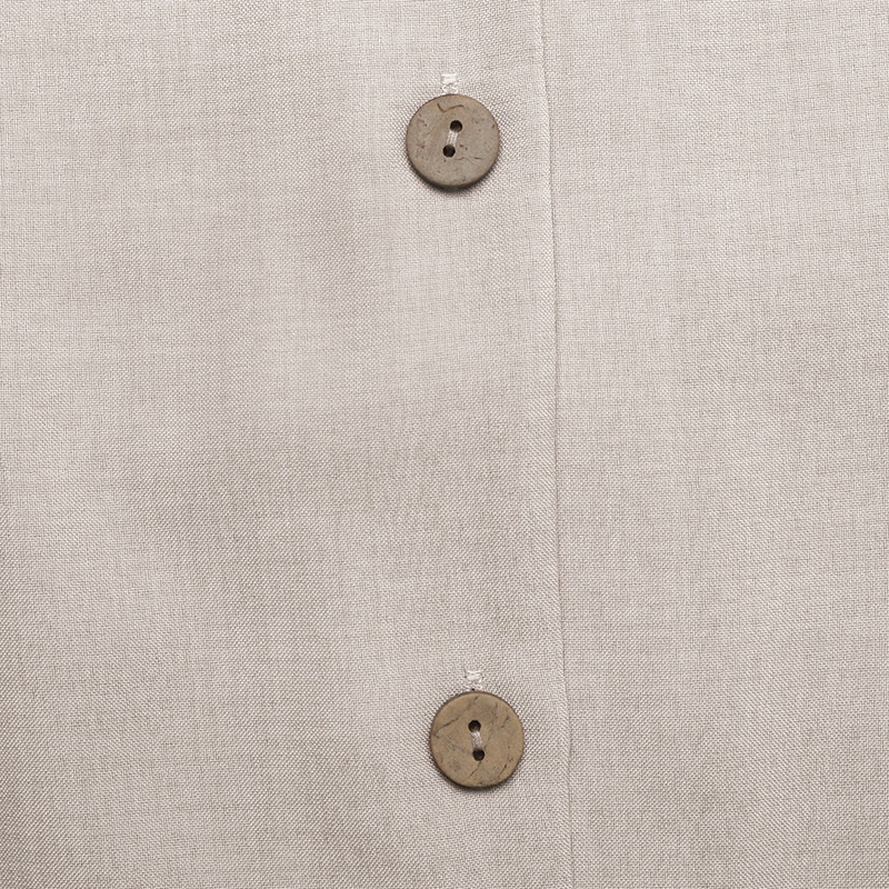Robe midi sans manches à col boutonné sur le devant et liens