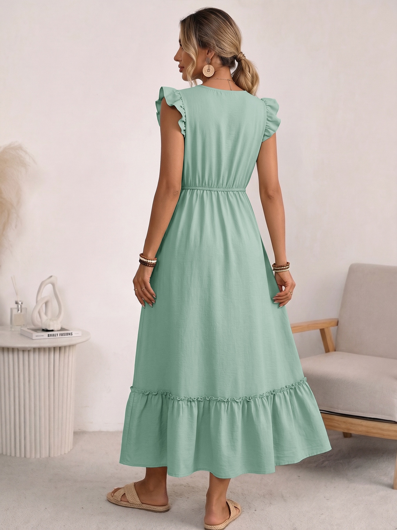 Abito lungo boho con maniche a volant ricamate