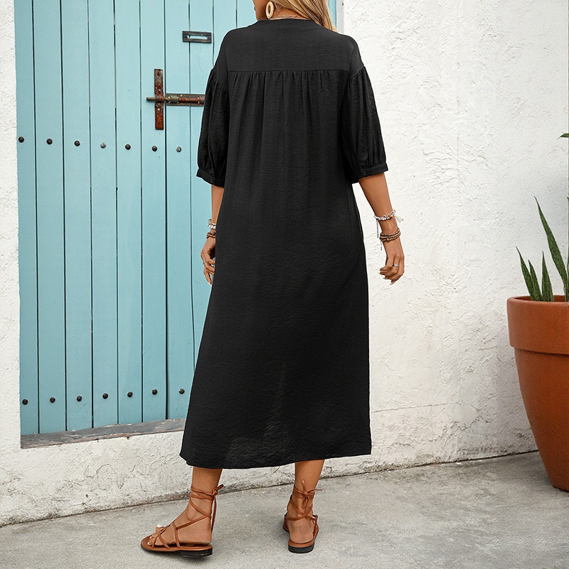 Robe midi boutonnée brodée sur le devant avec manches bouffantes