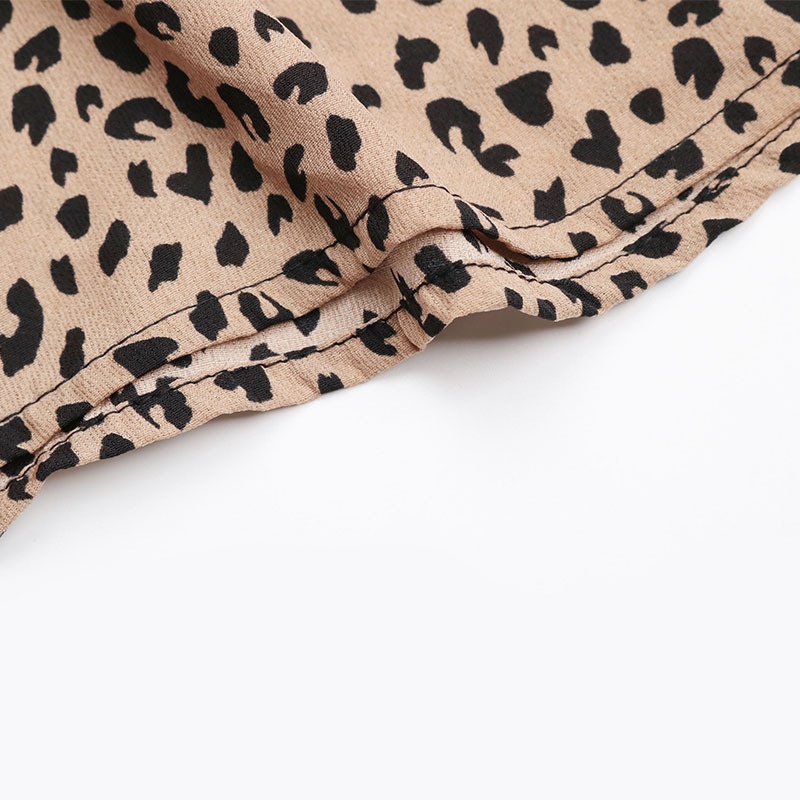 Robe sans manches à volants et col en V pour femme