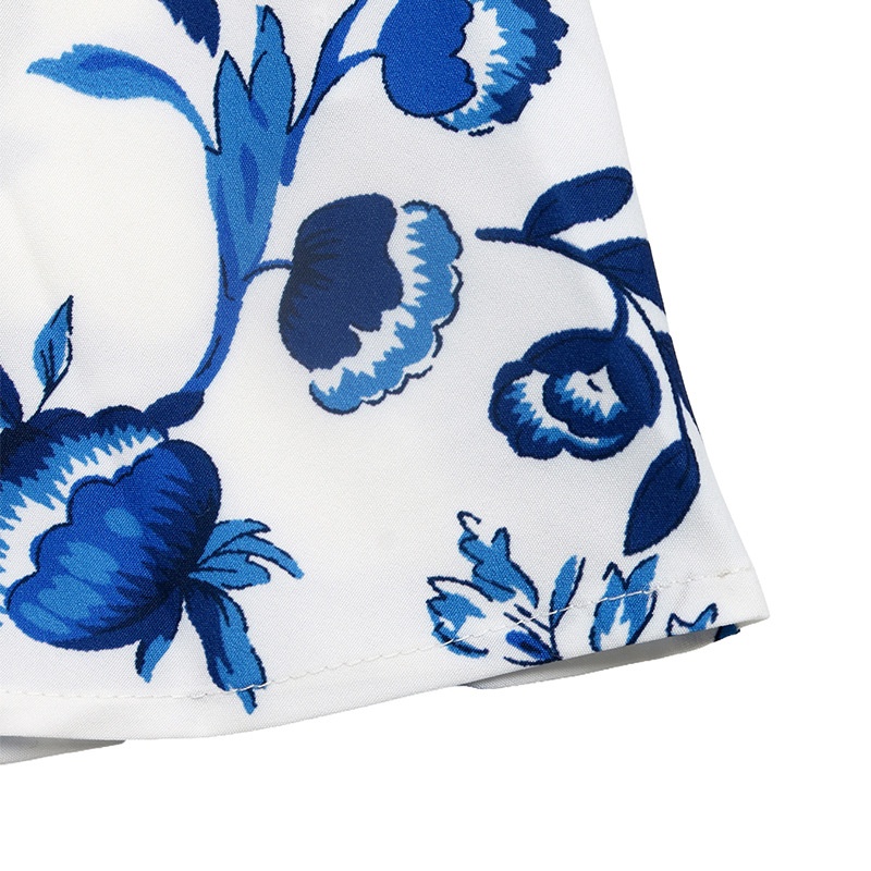 Robe mini dos nu à fleurs bleues et blanches avec découpes