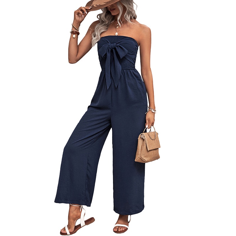 Combinaison bustier bleu marine à jambes larges et nœud papillon sur le devant