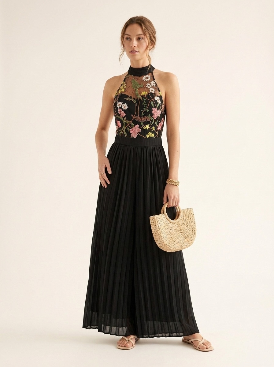 Combinaison noire à fleurs, dos nu, plissée, jambes larges