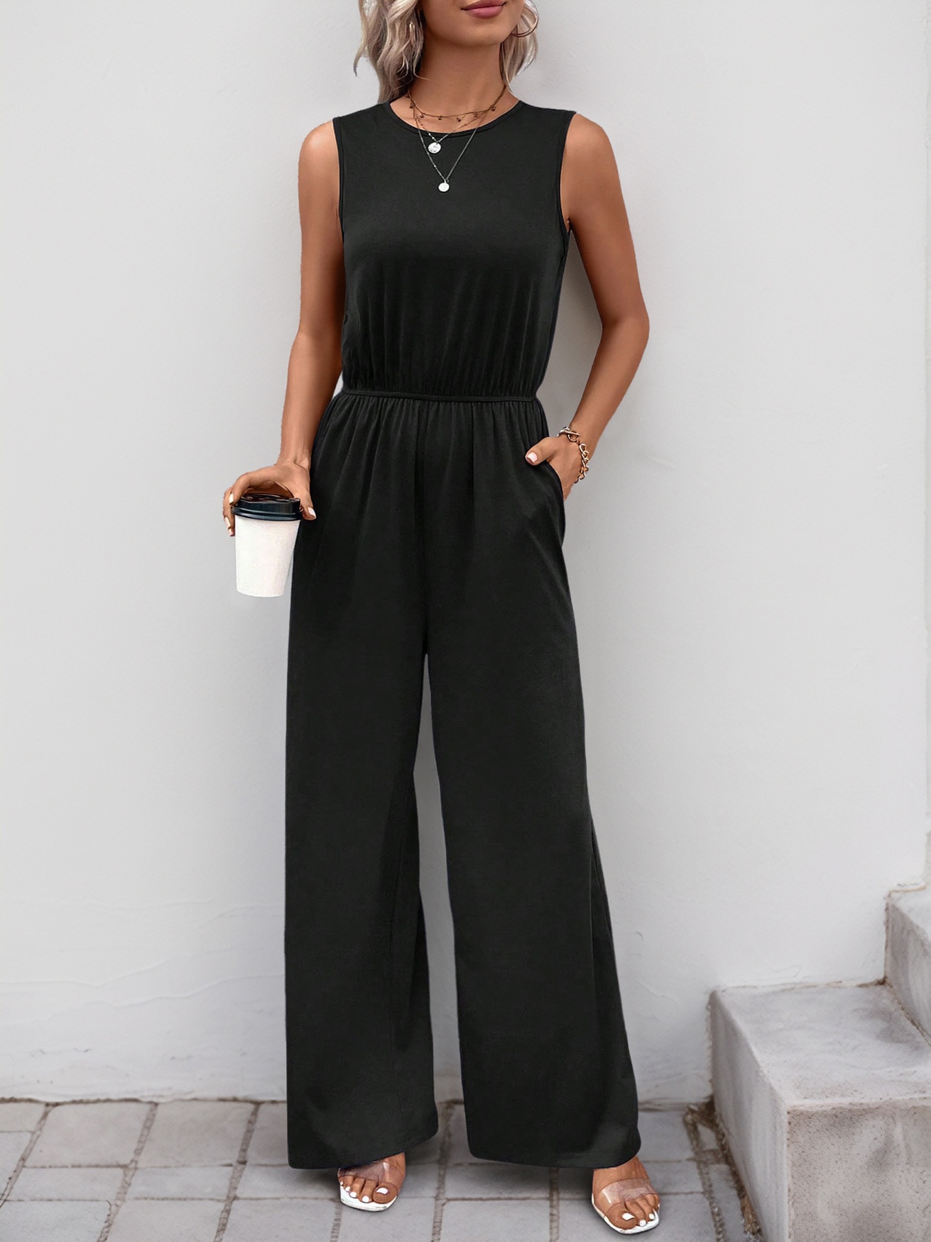 Combinaison sans manches à jambes larges et poches pour femme