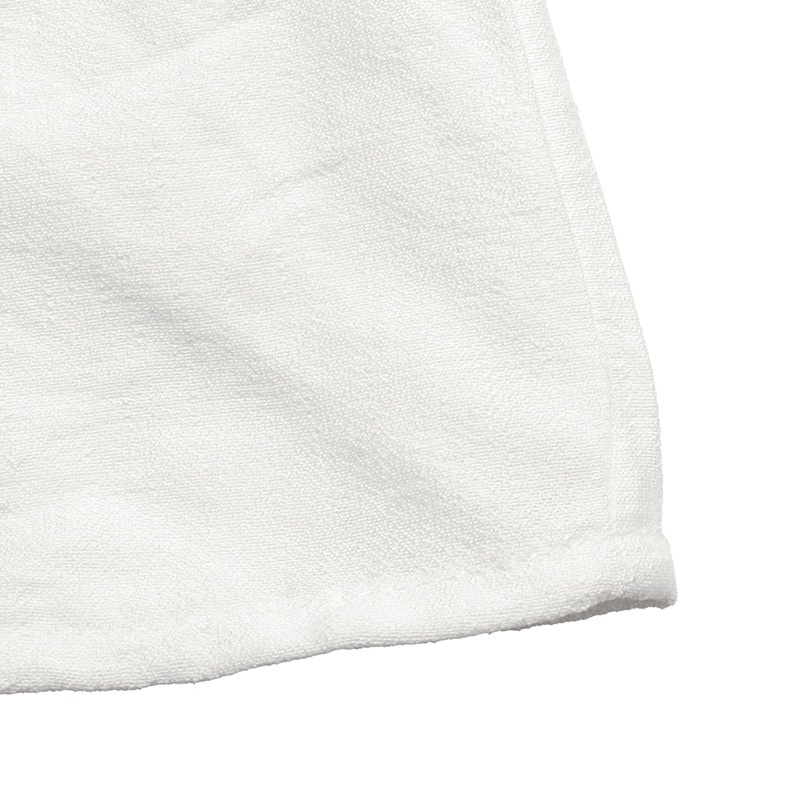 Combinaison blanche en dentelle à col en V, manches à volants et jambes larges