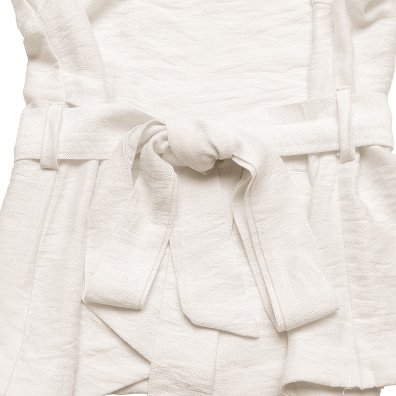 Ensemble haut asymétrique et jupe longue géométrique