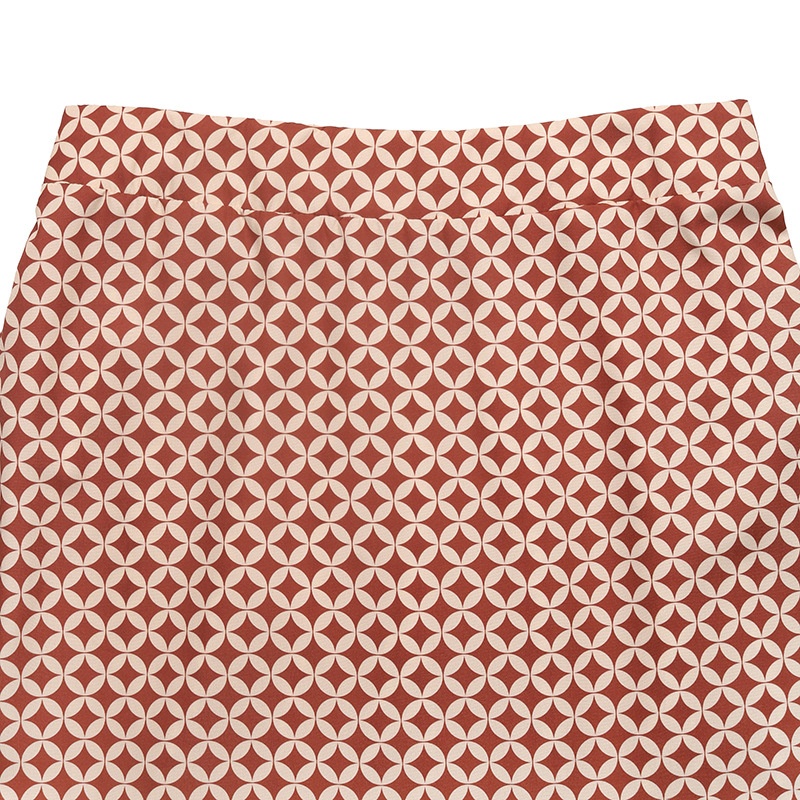 Ensemble haut asymétrique et jupe longue géométrique