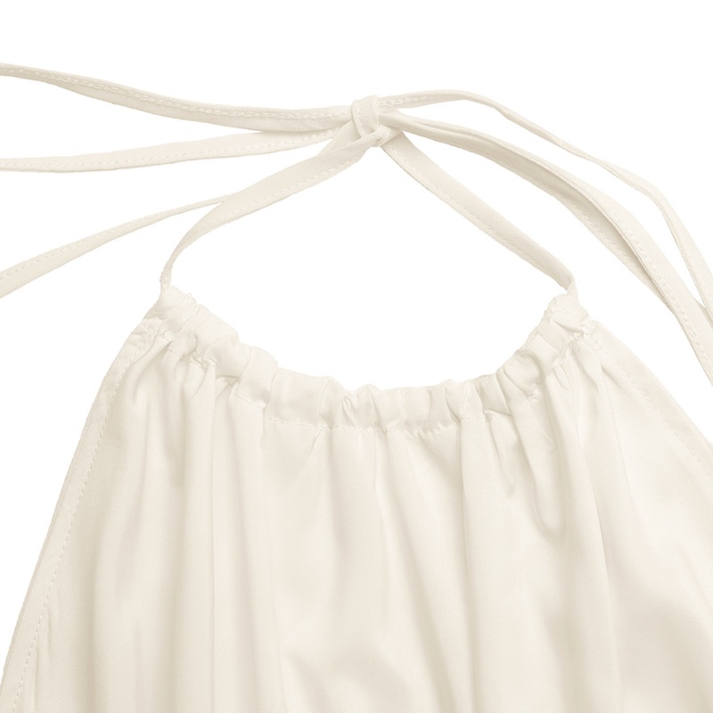 Haut péplum froncé à col halter pour femme