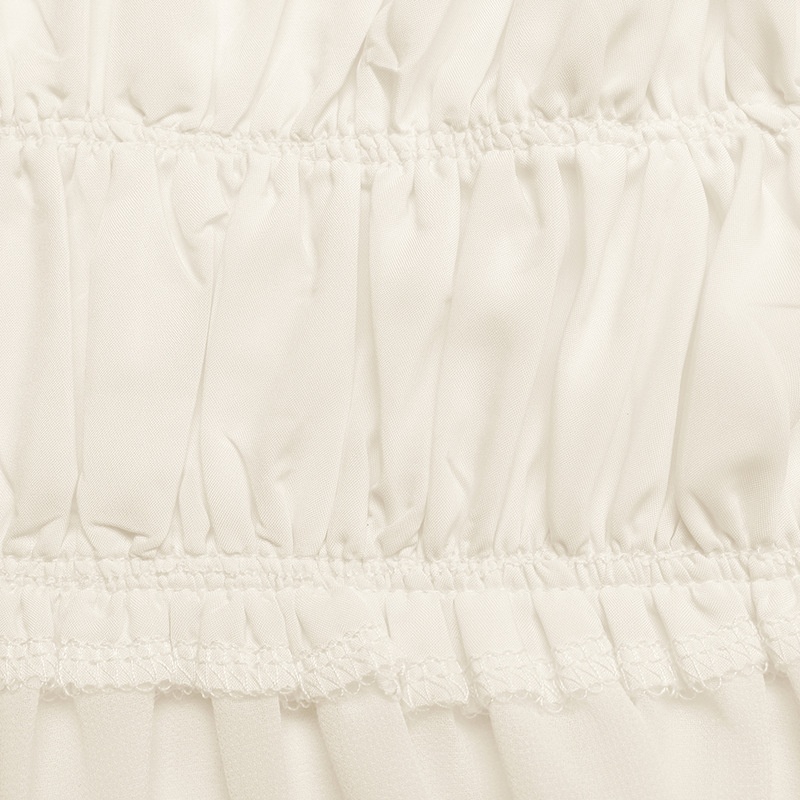 Haut péplum froncé à col halter pour femme