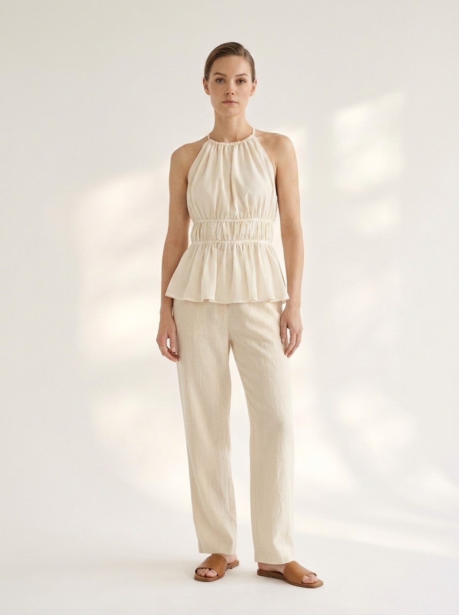 Haut péplum froncé à col halter pour femme