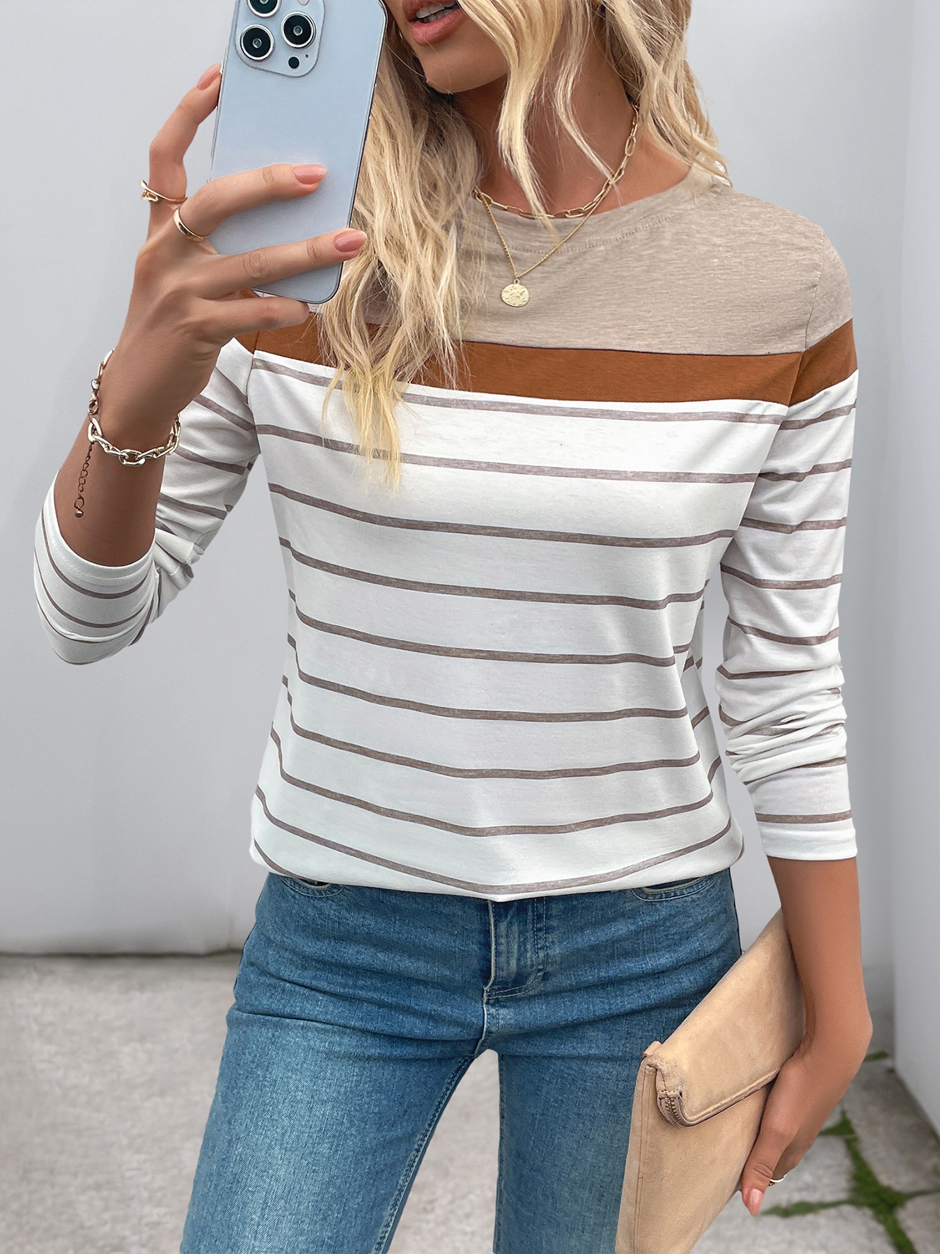 Top da donna a maniche lunghe a righe con blocchi di colore