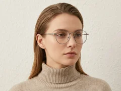 BS0218-0124_Silver_Round_Titanium_Glasses_corner-tryon_female