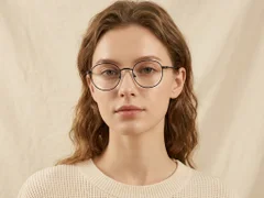 BS0218-0141_Black_Oval_Titanium_Glasses_corner-tryon_female
