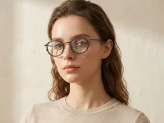 BS0218-0185_Grey_Oval_Titanium_Glasses_corner-tryon_female