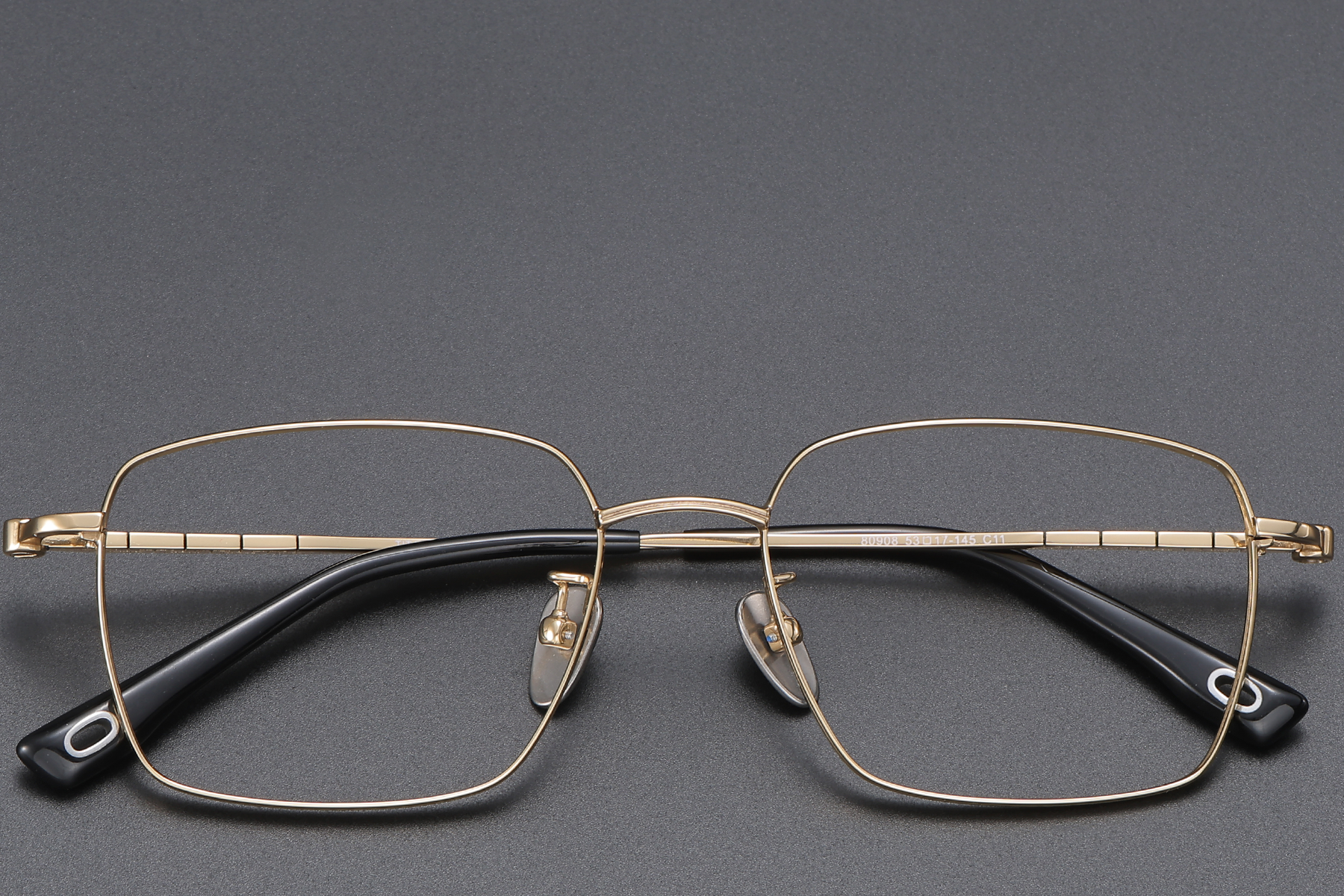 BS1913-0424_Golden_Rectangular_Titanium_Glasses_front