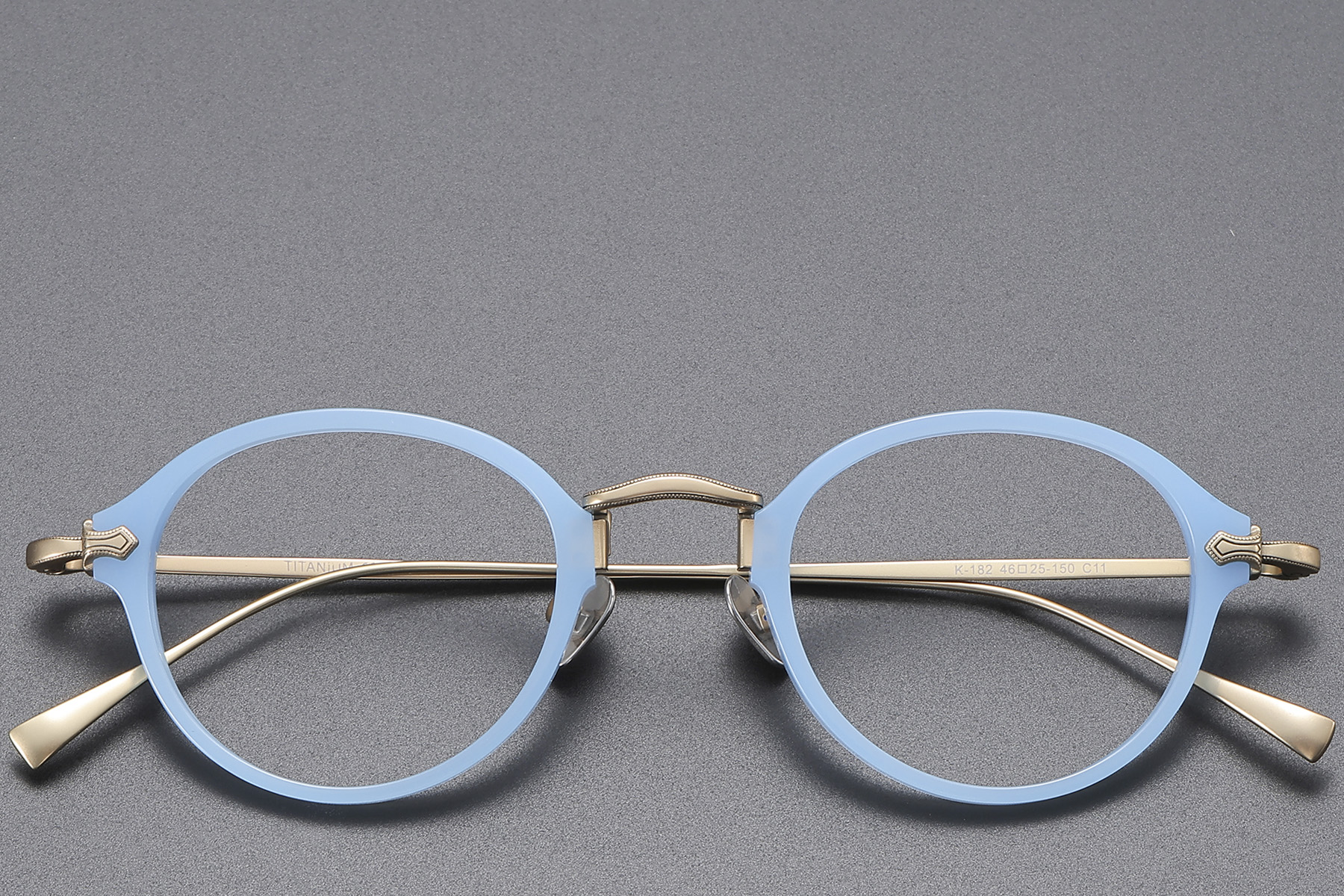 BS1913-0490_Blue_Oval_Titanium_Glasses_front