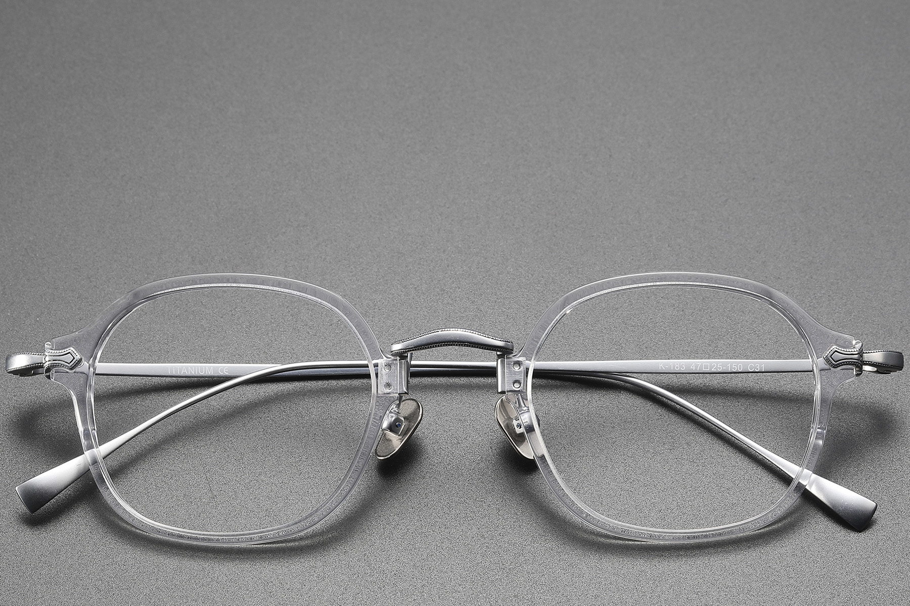 BS1913-0496_Transparent_Oval_Titanium_Glasses_front