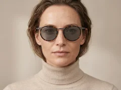 BS1913-0697_Tortoiseshell_Oval_Titanium_sunglasses-tryon_female