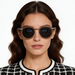bs1913-0698_green_oval_titanium_sunglasses_model