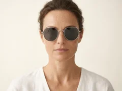 BS1913-0708_Silver_Oval_Titanium_sunglasses-tryon_female