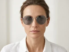 BS1913-0709_Black_Oval_Titanium_sunglasses-tryon_female