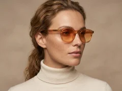 BS2503-0200_Orange_Oval_Plastic_Sunglasses-tryon_female
