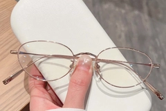 BS423-0318_Pink_Oval_Titanium_Glasses_front