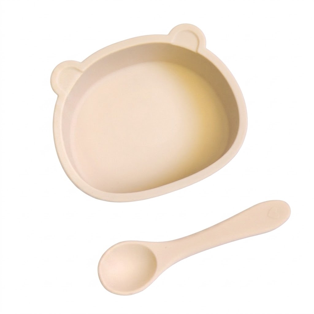 Set di ciotola e cucchiaio in silicone a forma di orsetto per la pappa del bambino.