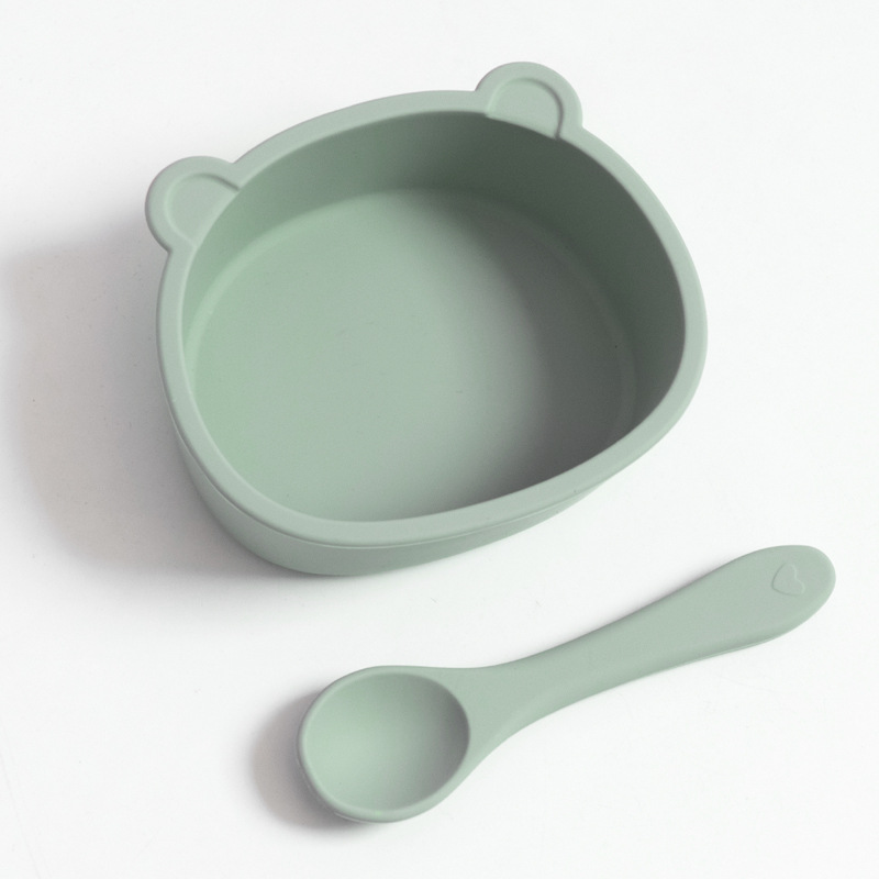 Set di ciotola e cucchiaio in silicone a forma di orsetto per la pappa del bambino.