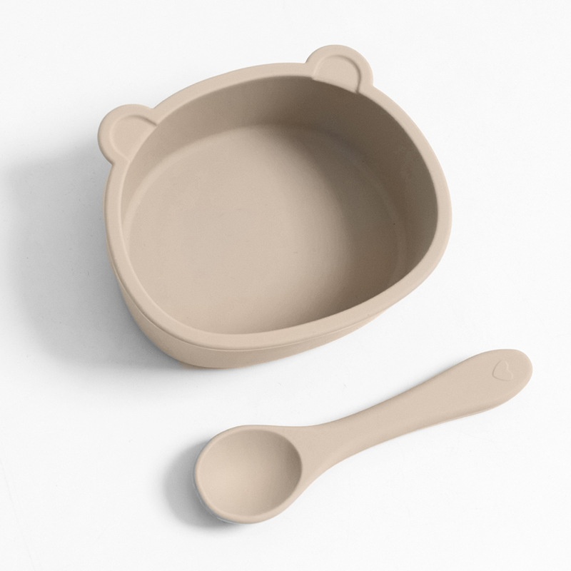 Set di ciotola e cucchiaio in silicone a forma di orsetto per la pappa del bambino.