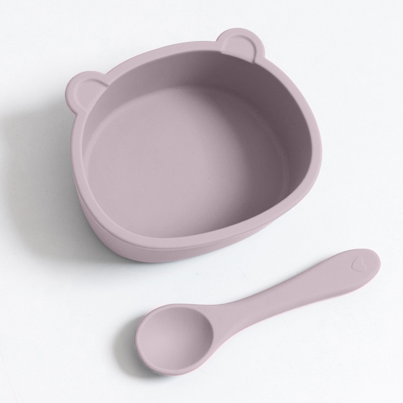 Set di ciotola e cucchiaio in silicone a forma di orsetto per la pappa del bambino.