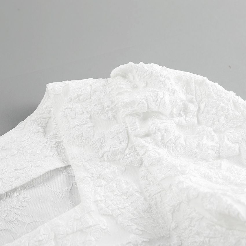 Blusa peplum de cuello cuadrado con estampado floral texturizado