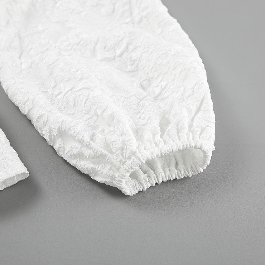 Blusa peplum de cuello cuadrado con estampado floral texturizado