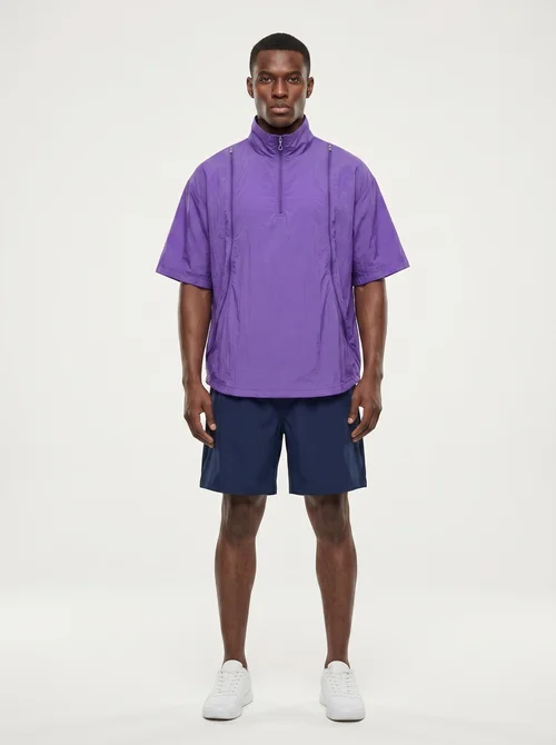 Poncho sportivo unisex leggero con mezza zip