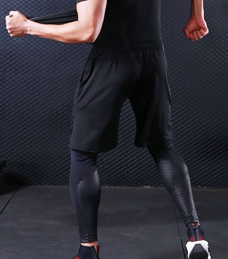 Pantaloncini da allenamento da uomo, vestibilità ampia e ad asciugatura rapida: abbigliamento sportivo estivo traspirante per attività all'aperto.