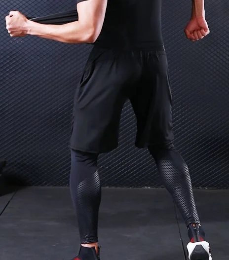 Pantaloncini da allenamento da uomo, vestibilità ampia e ad asciugatura rapida: abbigliamento sportivo estivo traspirante per attività all'aperto.